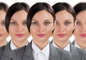 Woman in work outfit with multiple aliases.